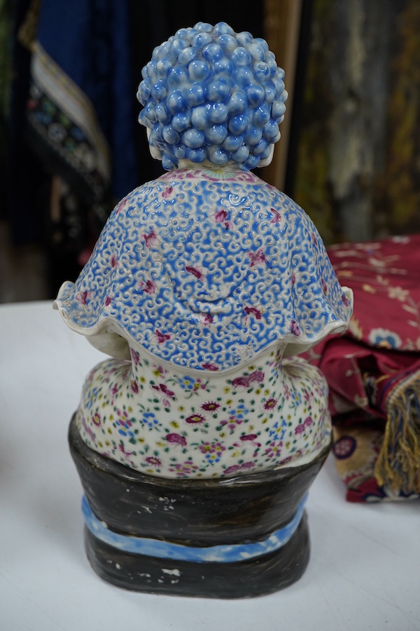 A Chinese famille rose figure of Buddha, Republic period, 30cm